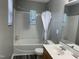 Bathroom featuring a tub and shower combo, toilet, and sink with vanity at 1208 Shining Water Ln, Creedmoor, NC 27522