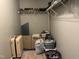 Walk-in closet featuring shelving, suitcase, and storage for shoes and belongings at 1208 Shining Water Ln, Creedmoor, NC 27522