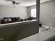 Comfortable living room with plush sofa, accent chairs, and ample lighting at 1208 Shining Water Ln, Creedmoor, NC 27522