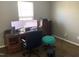 Home office featuring desk with monitors and a comfortable rolling chair at 1208 Shining Water Ln, Creedmoor, NC 27522