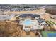Aerial view of community amenities including a pool, clubhouse, tennis court, and more at 1215 White Flint Cir, Durham, NC 27703