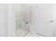 Bathroom featuring walk in shower with glass surround and bench at 1215 White Flint Cir, Durham, NC 27703
