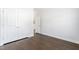 Empty bedroom with hardwood flooring and closet at 1215 White Flint Cir, Durham, NC 27703