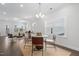 Dining area with lots of natural light and views into the living room at 1215 White Flint Cir, Durham, NC 27703