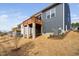 Charming home featuring a wood deck overlooking a grassy lawn, perfect for outdoor relaxation at 1215 White Flint Cir, Durham, NC 27703