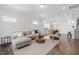 Bright living room featuring hardwood floors and modern furnishings at 1215 White Flint Cir, Durham, NC 27703