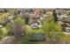 Aerial view of the neighborhood, highlighting the tree coverage and property layout at 128 Warren Ave, Oxford, NC 27565