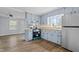 Kitchen featuring a refrigerator and stainless steel appliances at 128 Warren Ave, Oxford, NC 27565