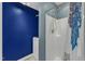 Cozy bathroom features a shower with curtains and a laundry area with a washer in the background at 131 Dove Cottage Ln, Cary, NC 27519