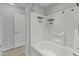 A well-maintained full bath with a tub and shower combo and storage niches for essentials at 131 Dove Cottage Ln, Cary, NC 27519