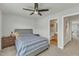 Comfortable bedroom with a connecting bathroom and bedside table creating a functional and relaxing space at 131 Dove Cottage Ln, Cary, NC 27519