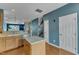 Open concept kitchen with stainless steel appliances, a kitchen island, and ample cabinetry at 131 Dove Cottage Ln, Cary, NC 27519