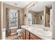Bathroom with a double sink vanity and framed mirror at 131 Hay Field Drive Dr, Clayton, NC 27520