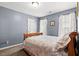 Bedroom with carpet, a bed, and natural light from the windows at 131 Hay Field Drive Dr, Clayton, NC 27520