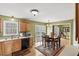 Kitchen area with a table with chairs, stainless steel appliances, and hardwood floors at 131 Hay Field Drive Dr, Clayton, NC 27520