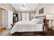 Main bedroom with large bed, dresser, and natural light from the window at 131 Hay Field Drive Dr, Clayton, NC 27520