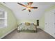 Cozy bedroom with a ceiling fan and green walls offers a tranquil retreat at 1320 Blue Heron Dr, Nashville, NC 27856