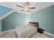 Bedroom featuring a neutral bedspread, ceiling fan, and gray carpet offers a blend of comfort and style at 1320 Blue Heron Dr, Nashville, NC 27856