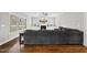 Bright living room features a fireplace, built-in shelves, and large windows with view to the outside at 1320 Blue Heron Dr, Nashville, NC 27856