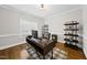 Bright office space with a sleek desk, shelving, a comfortable chair, and a window that provides ample natural light at 1320 Blue Heron Dr, Nashville, NC 27856