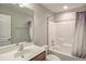 Bathroom featuring vanity and shower-tub with white shower curtain at 1354 Red Bud Ct, Wake Forest, NC 27587