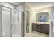 Bathroom featuring a walk-in shower and double sink vanity at 1354 Red Bud Ct, Wake Forest, NC 27587