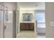Bathroom featuring a double vanity, shower, and soaking tub at 1354 Red Bud Ct, Wake Forest, NC 27587
