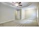 Bedroom featuring tray ceiling and ensuite bathroom at 1354 Red Bud Ct, Wake Forest, NC 27587