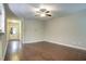 Hardwood floors in a open living room, with a light colored walls and many electrical outlets at 1354 Red Bud Ct, Wake Forest, NC 27587