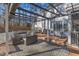 Inviting back deck with comfortable seating, a pergola, and backyard views at 14 Wedgewood Pl, Clayton, NC 27527