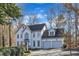 Lovely two-story residence with a two-car garage, set amongst mature trees and landscaping at 14 Wedgewood Pl, Clayton, NC 27527