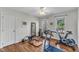 Bright home gym featuring modern exercise equipment and natural light from two windows at 14 Wedgewood Pl, Clayton, NC 27527
