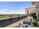 Relaxing balcony with comfortable seating and scenic views of the surrounding landscape at 140 W Franklin St # 406, Chapel Hill, NC 27516
