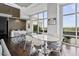 Bright conference room with large windows, offering a professional and comfortable meeting space at 140 W Franklin St # 406, Chapel Hill, NC 27516