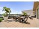 Spacious rooftop deck with multiple dining sets and panoramic city views at 140 W Franklin St # 406, Chapel Hill, NC 27516
