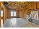 Unfinished basement space with visible framing, offering customization potential at 155 Georgetown Woods Dr, Youngsville, NC 27596