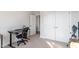 Bedroom featuring a workspace, closet and large window at 169 Hidden Bluff Dr, Chapel Hill, NC 27517