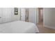 Spacious bedroom with a comfortable bed and seamless access to other rooms and a bright bathroom at 169 Hidden Bluff Dr, Chapel Hill, NC 27517