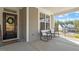 Inviting front porch with comfortable seating, perfect for relaxing outdoors at 169 Hidden Bluff Dr, Chapel Hill, NC 27517