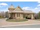View of the community entrance guard house with stone and brick accents at 169 Hidden Bluff Dr, Chapel Hill, NC 27517