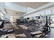 Well-equipped gym features state-of-the-art equipment and plenty of natural light with large windows and mirrors at 169 Hidden Bluff Dr, Chapel Hill, NC 27517