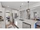 Bright, modern kitchen featuring a large island, stainless steel appliances, and ample storage at 169 Hidden Bluff Dr, Chapel Hill, NC 27517