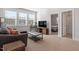 Inviting living room featuring neutral tones, lots of natural light, and comfortable seating arrangement at 169 Hidden Bluff Dr, Chapel Hill, NC 27517