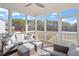 Inviting screened-in porch with comfortable seating, perfect for relaxing while enjoying the outdoor scenery at 169 Hidden Bluff Dr, Chapel Hill, NC 27517