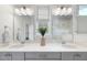 Bright bathroom featuring double vanity, quartz countertops, and modern fixtures at 1800 Bright Lantern Way, Wendell, NC 27591