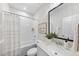 Cozy bathroom featuring a shower and tub combination, along with a charming vanity area at 1800 Bright Lantern Way, Wendell, NC 27591