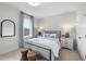 Calm bedroom with ample light, a comfortable bed, and charming side tables at 1800 Bright Lantern Way, Wendell, NC 27591