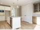 Kitchen island featuring granite countertops, stainless steel appliances, and custom cabinetry at 1800 Bright Lantern Way, Wendell, NC 27591