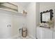 Functional laundry room featuring storage and a sink with modern fixtures at 1800 Bright Lantern Way, Wendell, NC 27591