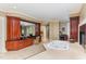 Luxurious main bathroom featuring a large jetted tub, dual vanities, cherry cabinets, and a walk-in shower at 1801 Oatlands Ct, Wake Forest, NC 27587